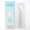 Whistle Wellness stainless steel tongue scraper in a protective case beside its box